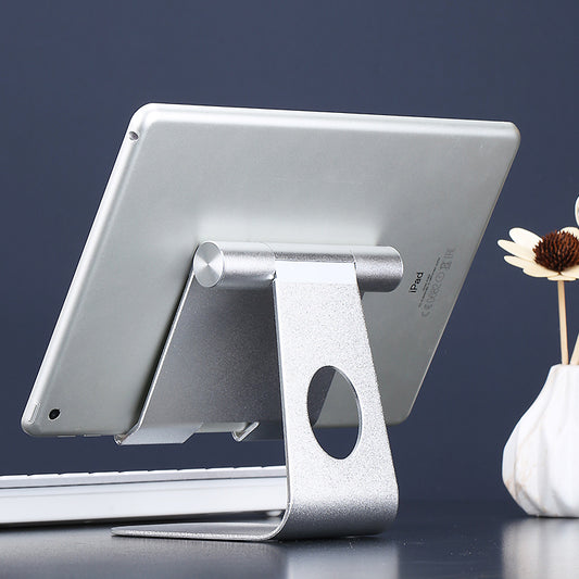 Adjustable Tablet Stand – Perfect for Apple iPads & More. Ideal for desks, reading, or video calls. Sleek, sturdy, and foldable for easy use anywhere.