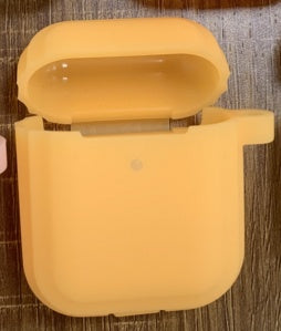 Glow Guard: Luminous Protective Cover for AirPods