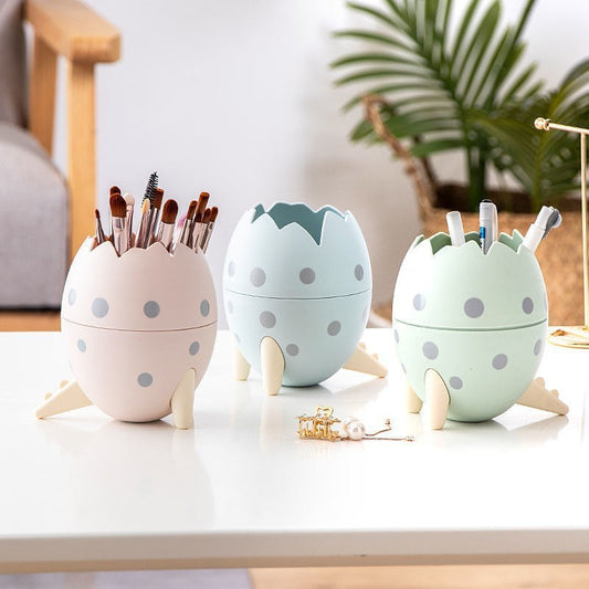 Dino Desk Buddy: Egg-Shaped Dinosaur Storage Box for Pens, Makeup Brushes, and More